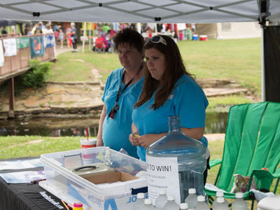 Volunteers at the Theater Bartlesville Sunfest booth